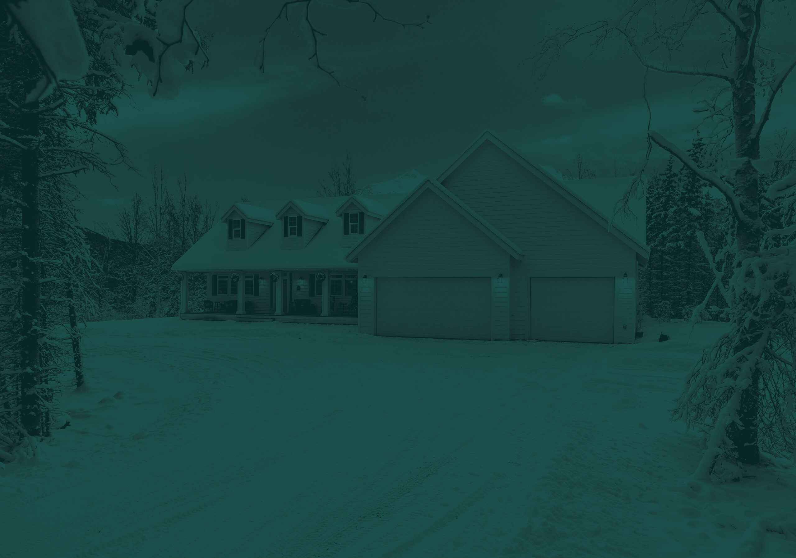 Custom built home in Alaska surrounded by snow during the winter