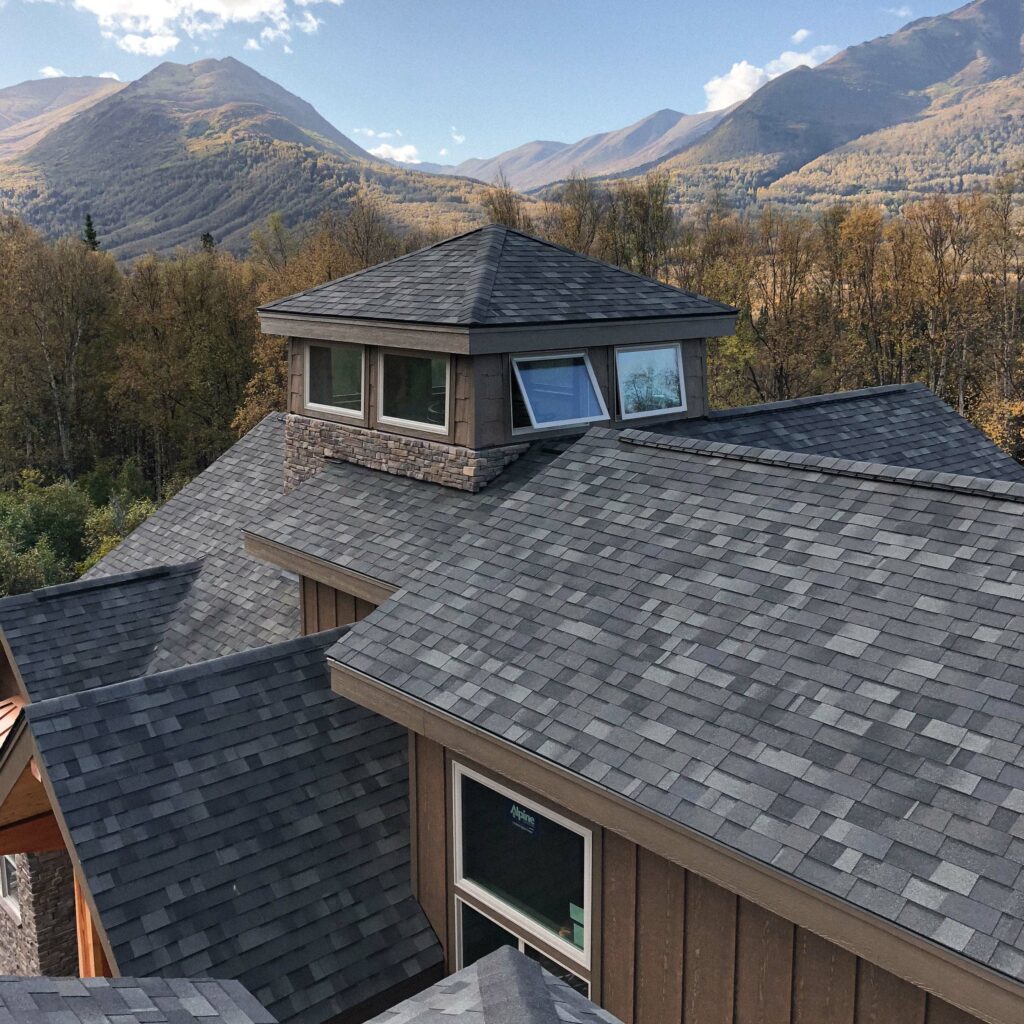 Small lookout room coming out of the roof a large house