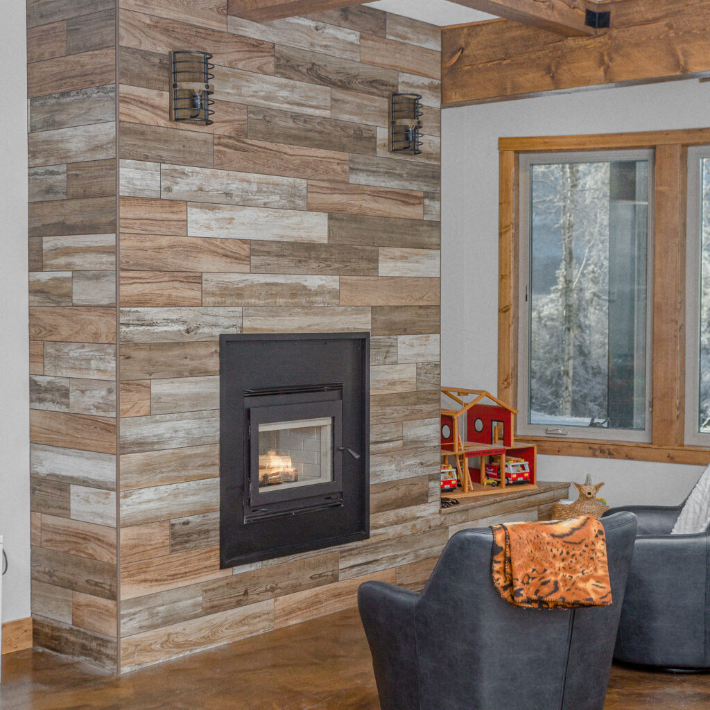 Living room of a house with fireplace and base of chimney