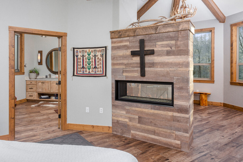 Custom fireplace in primary bedroom