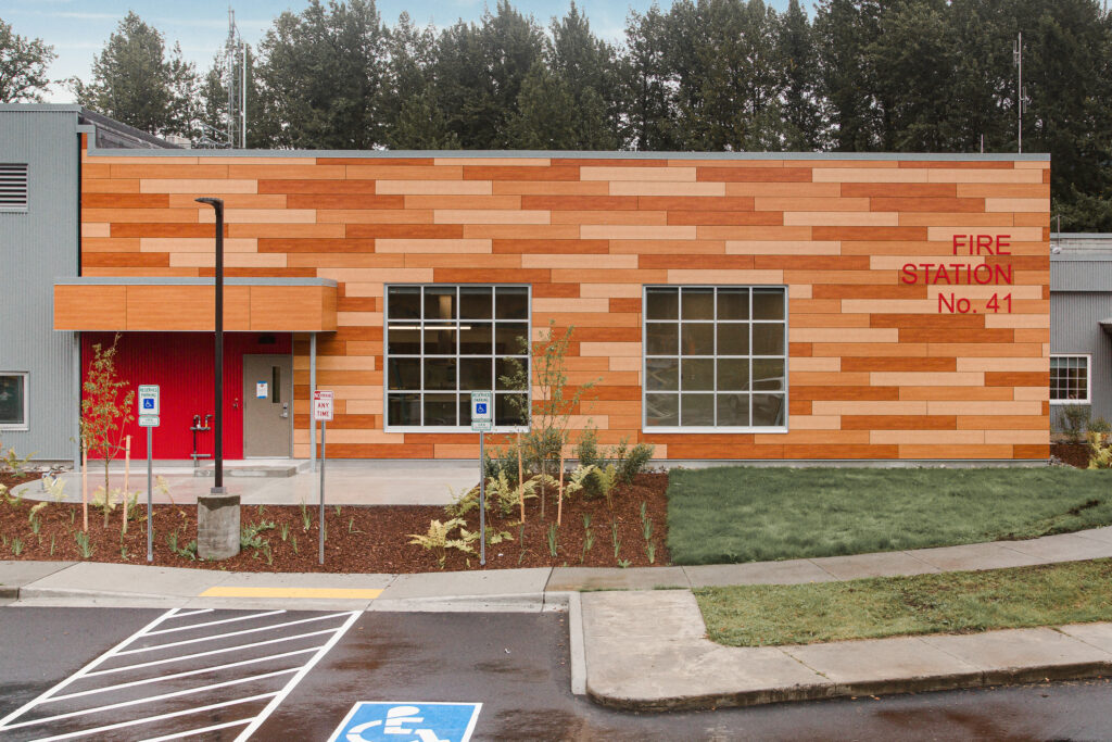 New fire station with wood paneling exterior and large windows