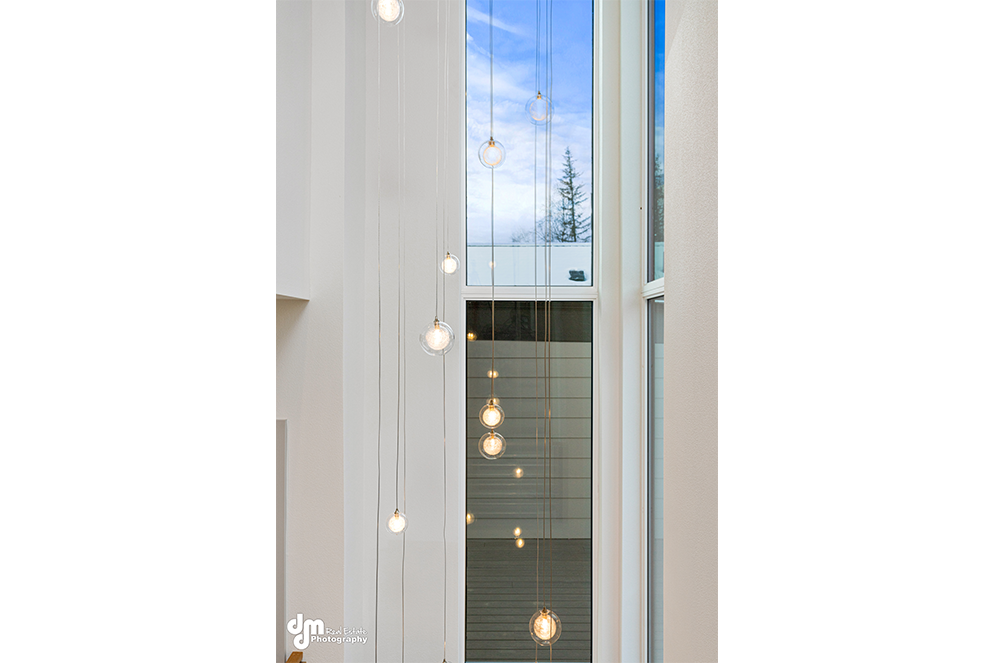 Windows & lighting inside modern custom built home in Alaska