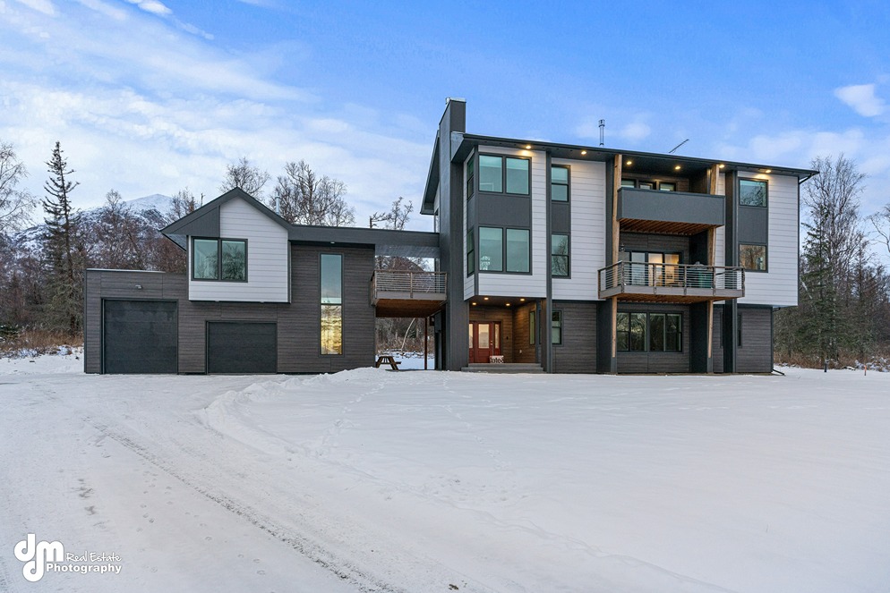 Exterior of modern 3-story custom built home in Alaska