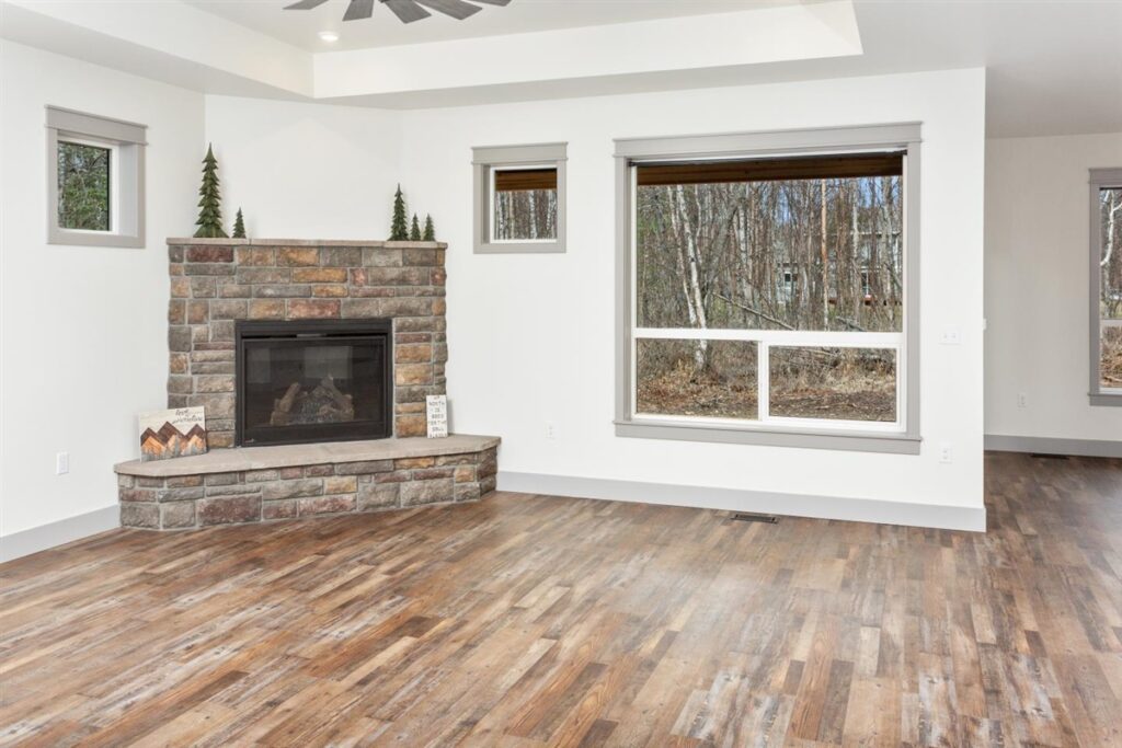 Traditional white home with custom fireplace