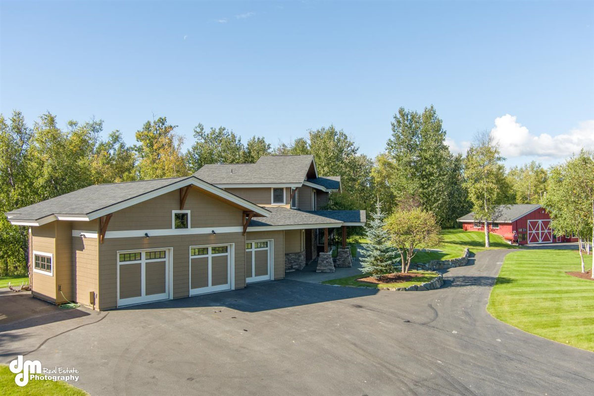 Custom built home in Alaska with 3-door garage