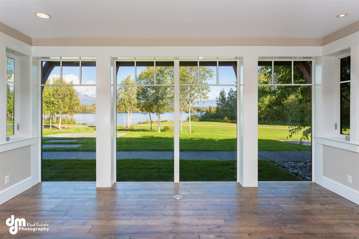 Patio doors in custom built home leading to garden