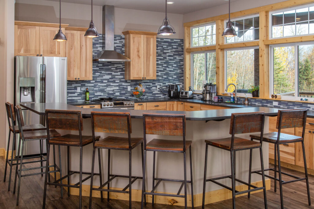 Kitchen of custom built home in Alaska featuring large kitchen island