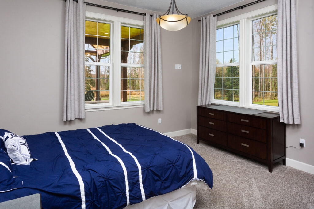 Custom built bedroom with large windows