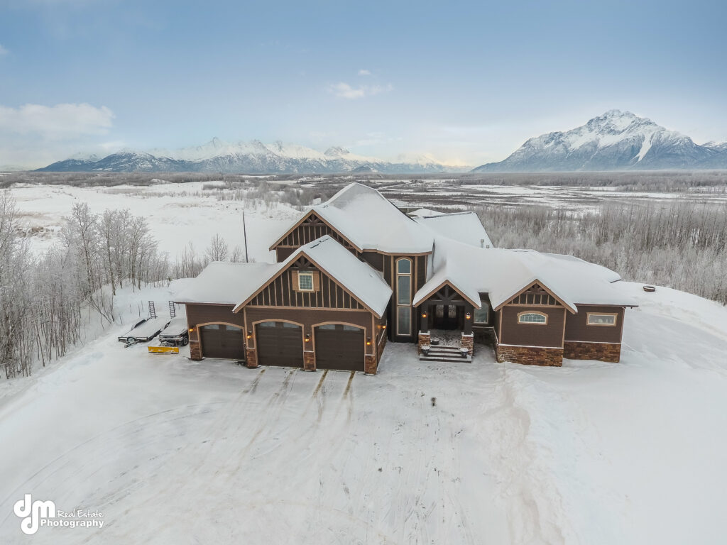 Exterior of Bluff Lot Estate in Wasilla during winter
